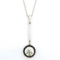 MINE DIAMOND & ONYX PENDANT<br>$9,800